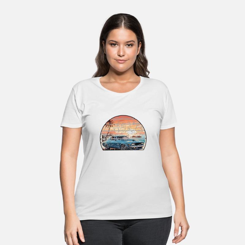 A muscle car cruisingon a coastal road.