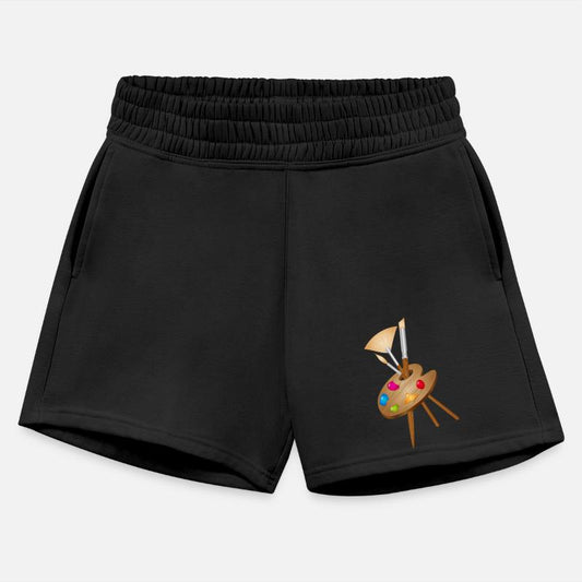 Artist's palette with colorful paints and brushes