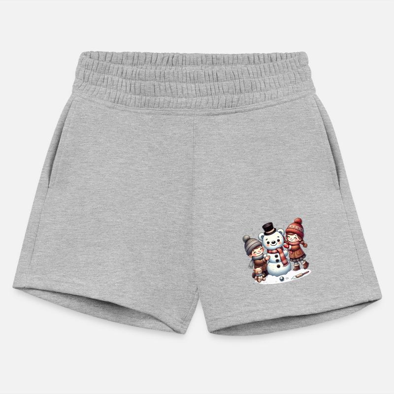 Winter fun: Children build a teddy snowman