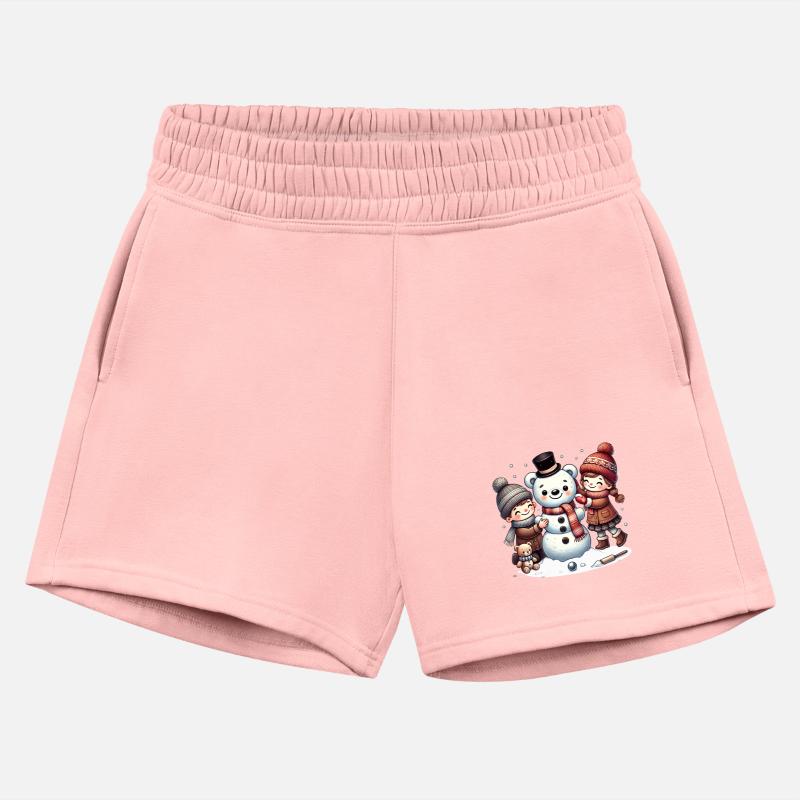 Winter fun: Children build a teddy snowman